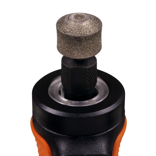 BLACKDECKER BCRT8K35 rotary tool with grinding stone attachment, close-up on white background.
